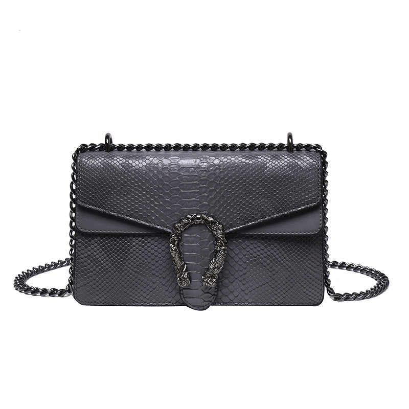 Maison Maryim Croc-Embossed Evening Bag — detail view — evening bag