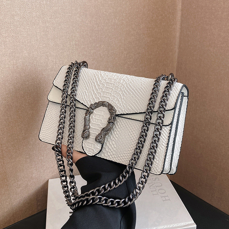 Maison Maryim Croc-Embossed Evening Bag — detail view — evening bag