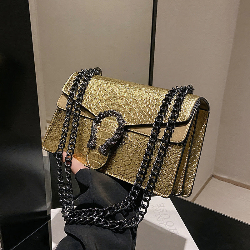 Maison Maryim Croc-Embossed Evening Bag — styled view — evening bag