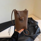 Maison Maryim Pendant Mini Crossbody — vegan leather mini bag with signature ball-pendant charm, Mélange collection