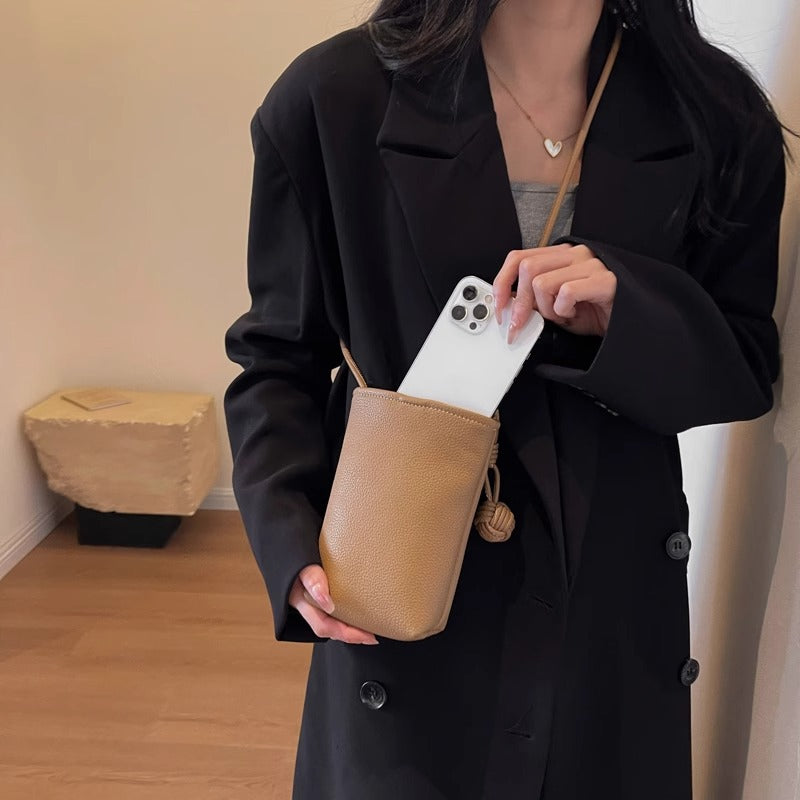 Maison Maryim Pendant Mini Crossbody — vegan leather mini bag with signature ball-pendant charm, Mélange collection