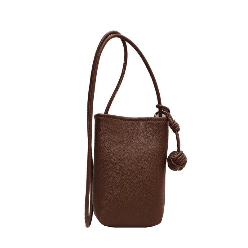 Maison Maryim Pendant Mini Crossbody — vegan leather mini bag with signature ball-pendant charm, Mélange collection